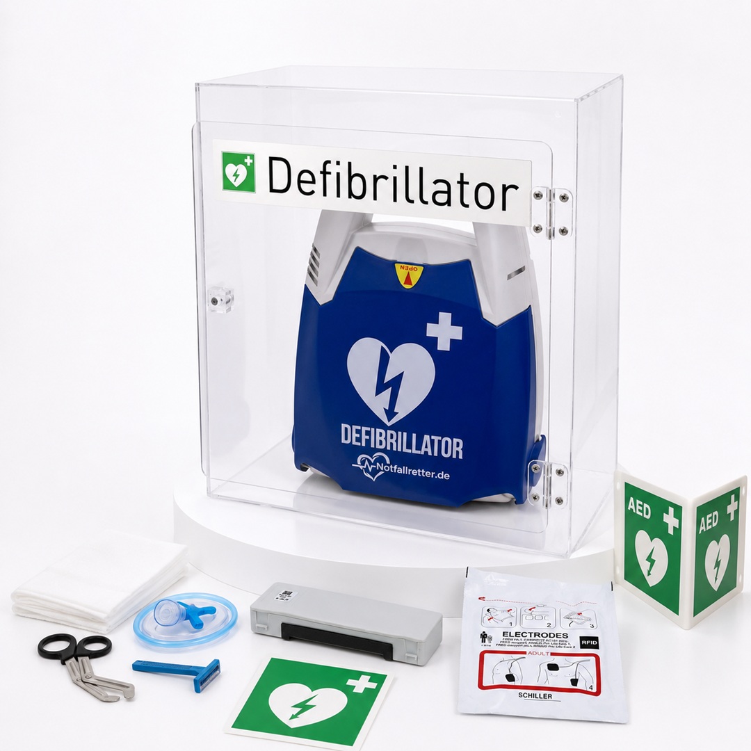 DEA Defibrillator-Set von Notfallretter.de mit Acryl-Wandkasten, AED-Standortschild und Notfallkit.